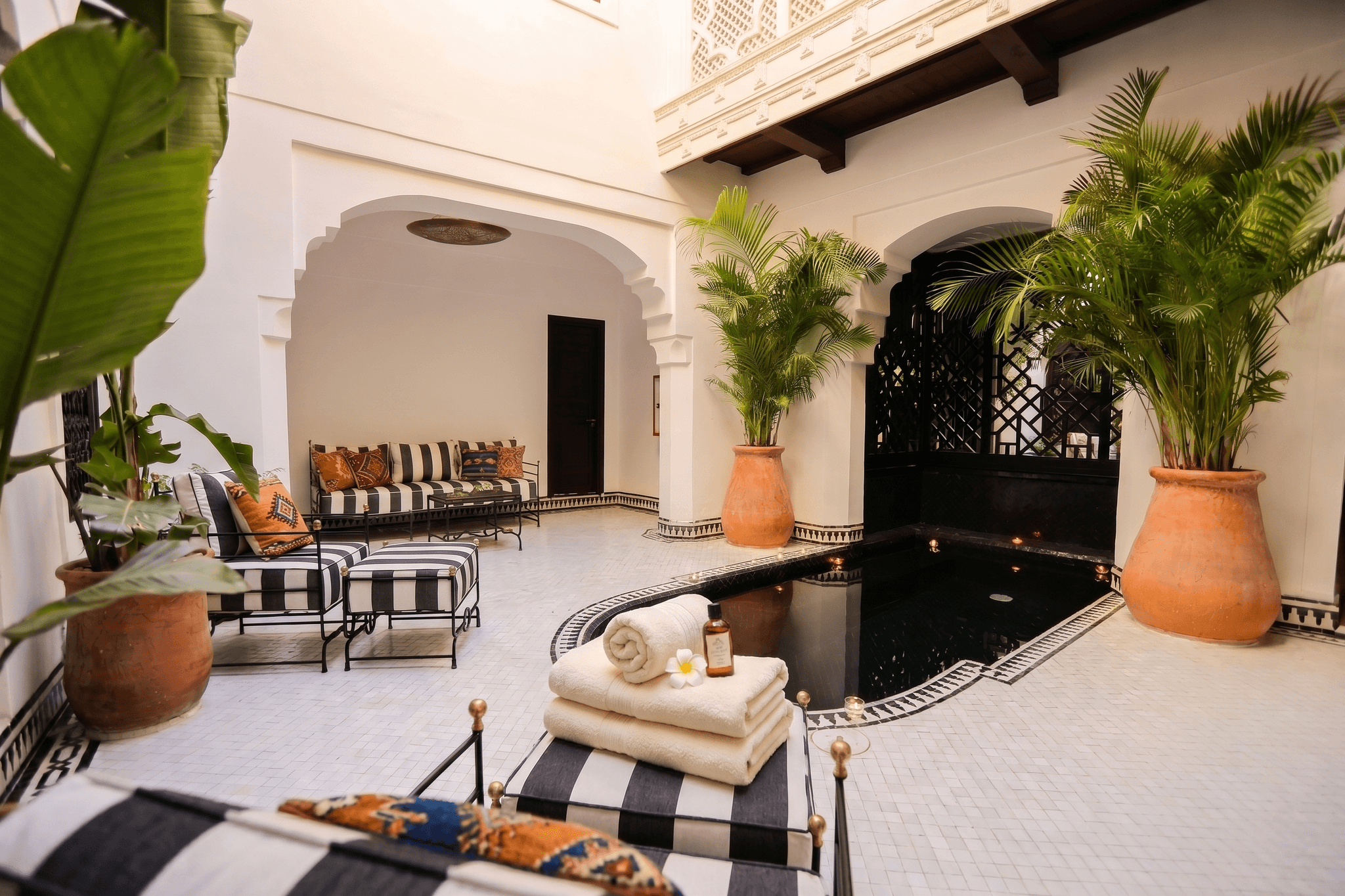 Pool courtyard with loungers